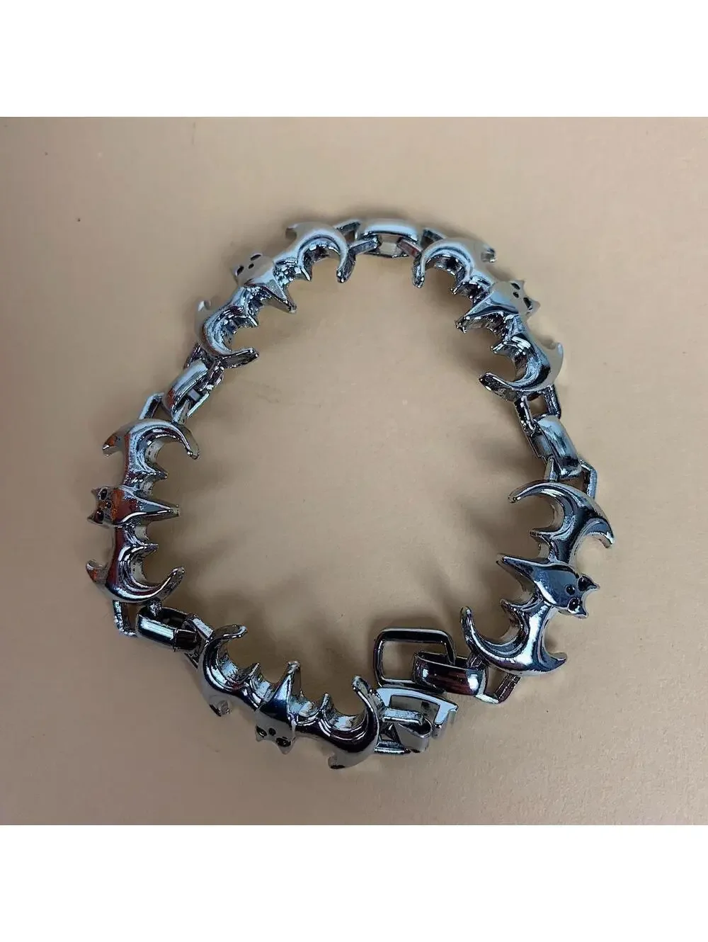 Y2k 2000s style grunge opium silver bat pendant bracelet